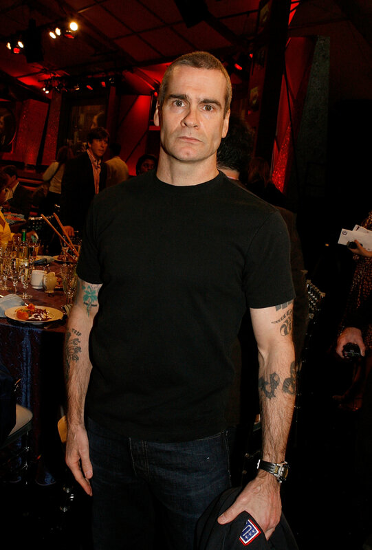 Man with tattoos at event