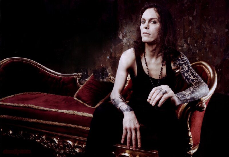 Man with Tattoos on Couch — Black