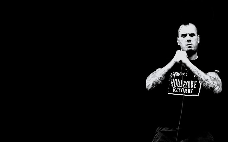man with tattoos performing