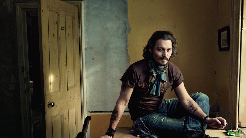 Man with Tattoos Sitting — Brown, Dramatic