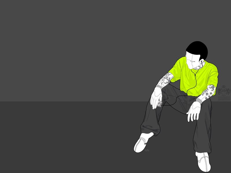 man with tattoos sitting