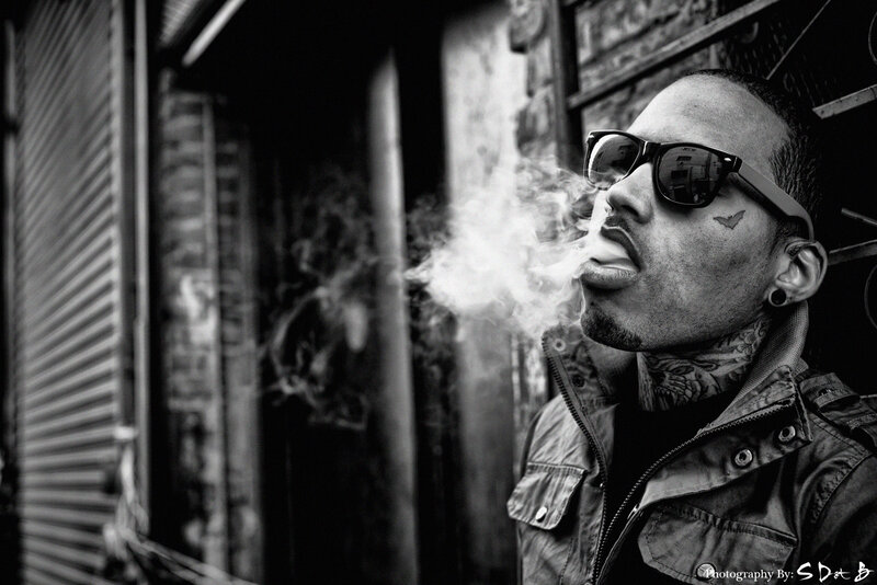 Man with Tattoos Smoking — Black
