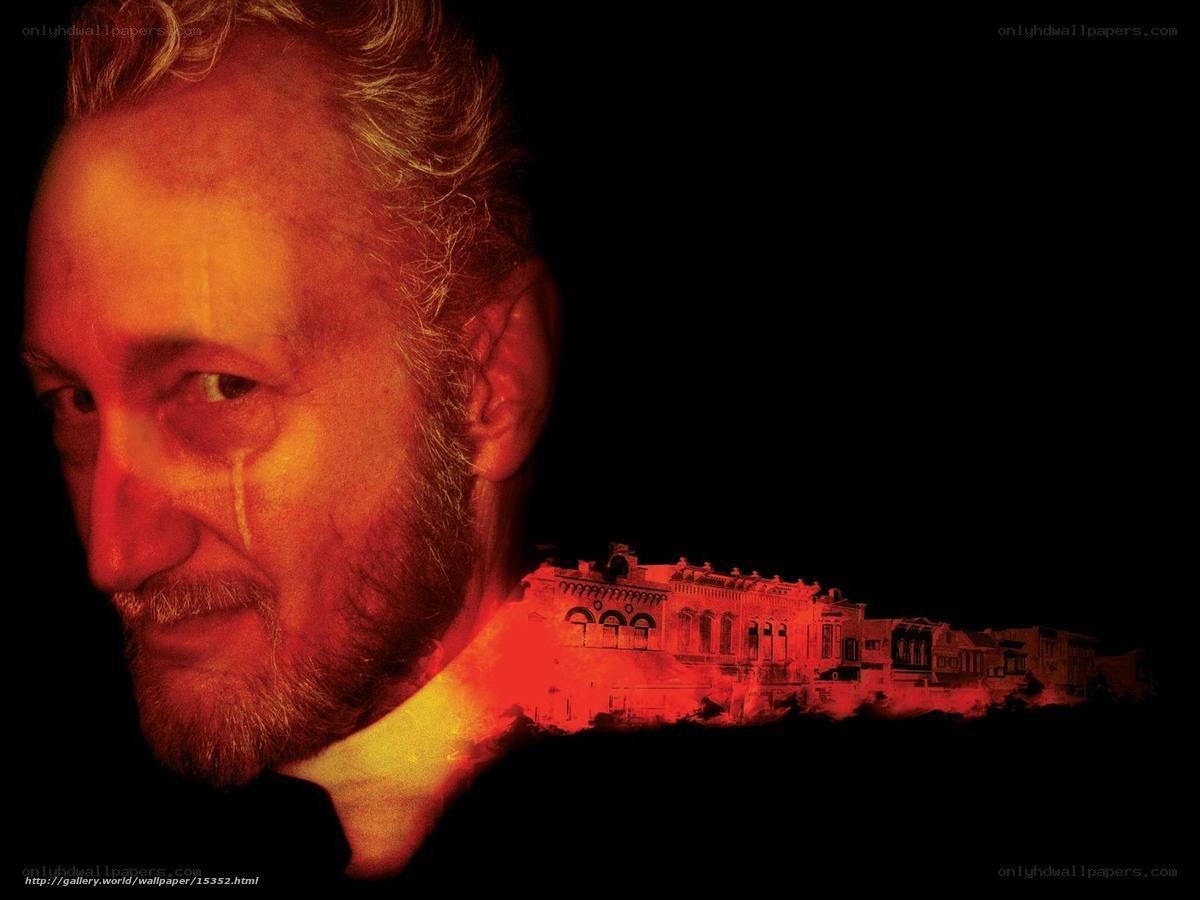 Man with tear and building overlay