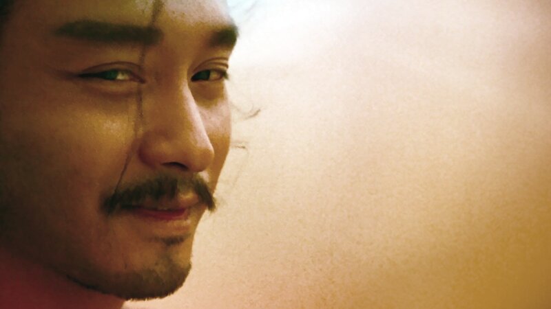 man with tear on face