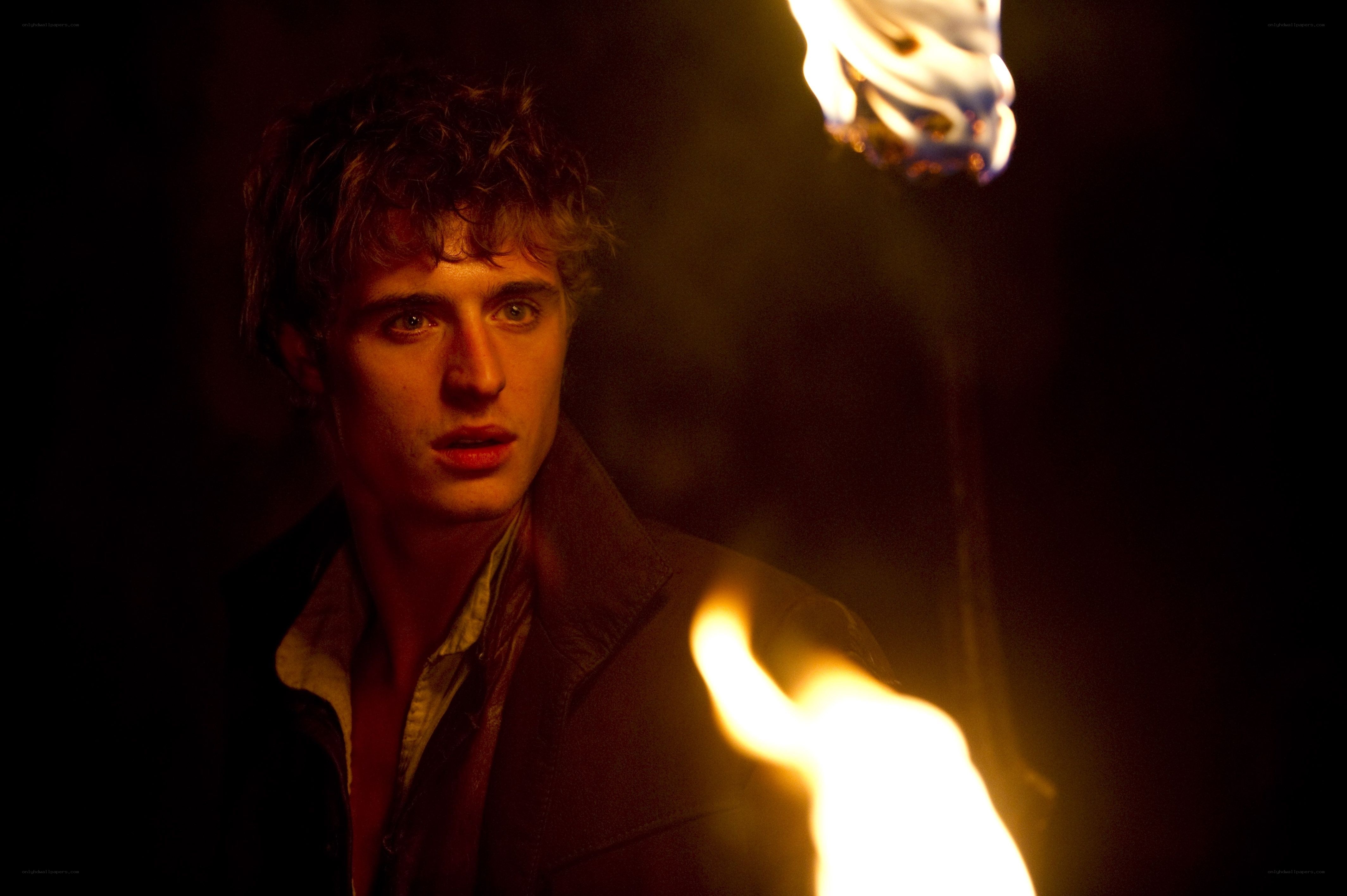 man with torch in dark