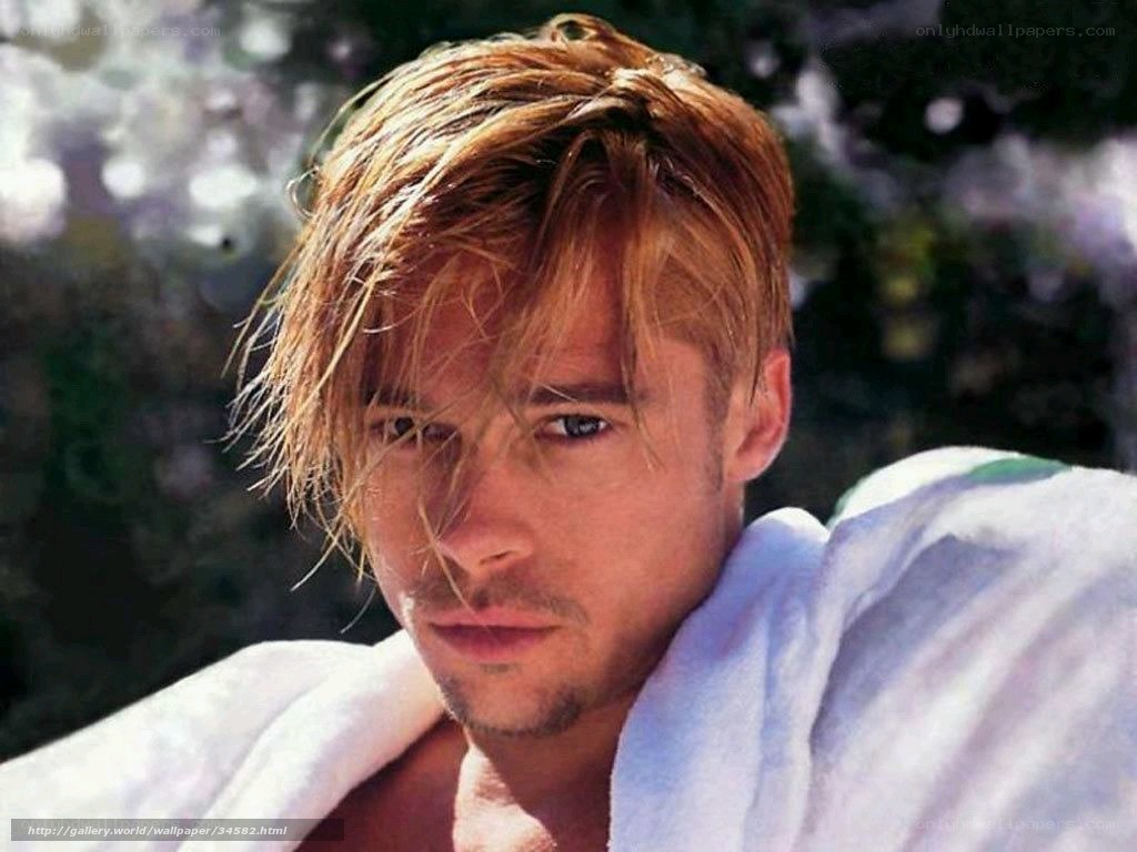 man with towel over shoulder