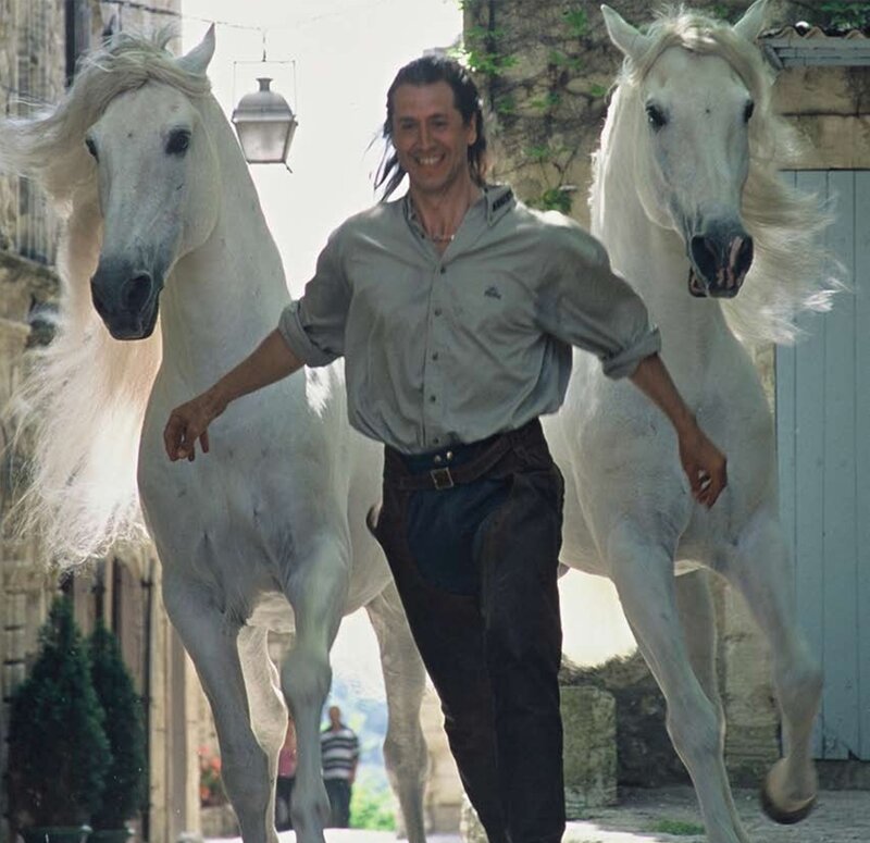 Man with Two White Horses