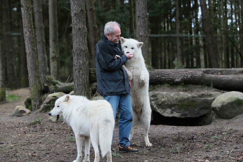 Man with Two White Wolves
