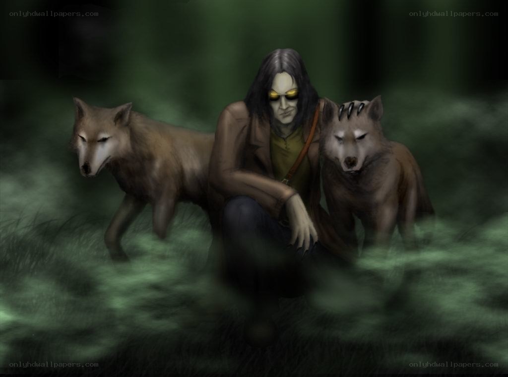 man with two wolves in forest