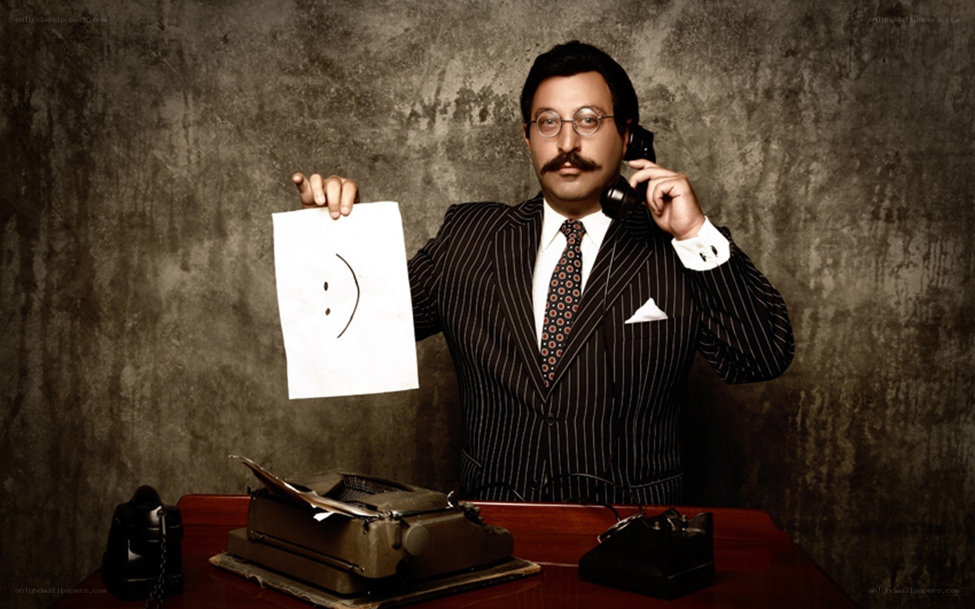 Man with typewriter and smiley face