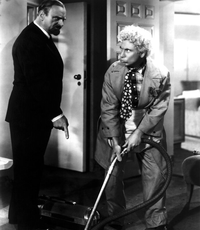 Man with Vacuum Cleaner