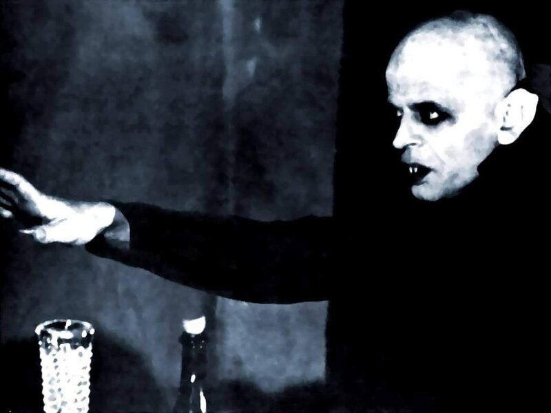 man with vampire makeup