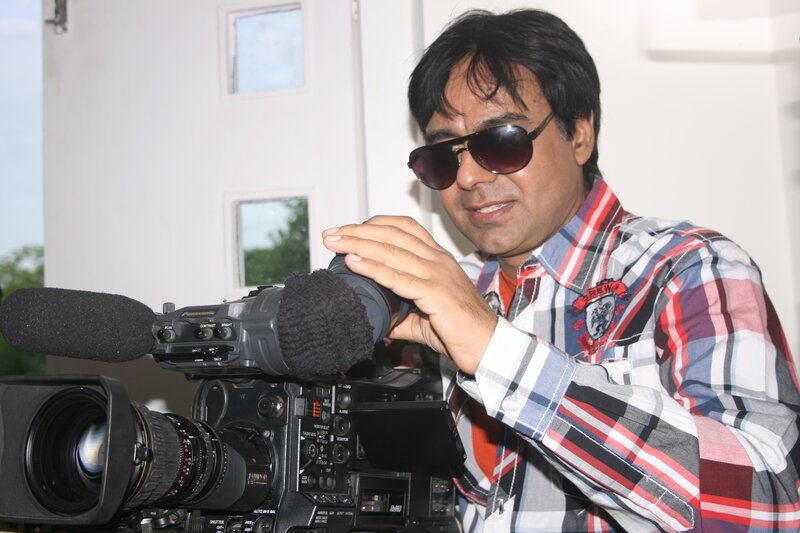 Man with Video Camera — Red