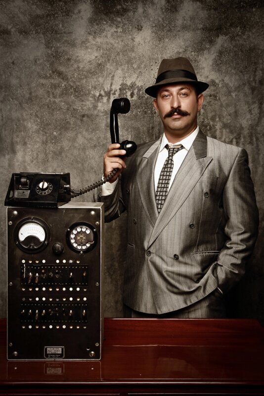 Man with vintage telephone