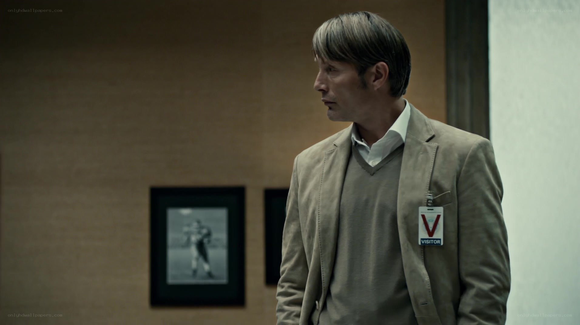 man with visitor badge