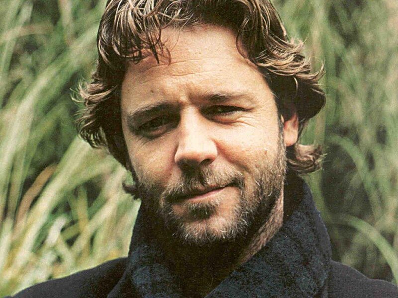 man with wavy hair and beard