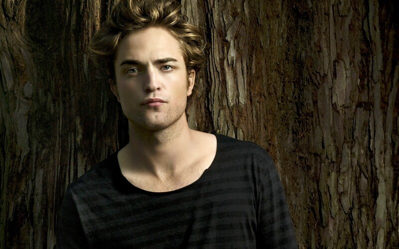 Man with Wavy Hair — Brown, Serious, Photograph, Tree Bark, Black Shirt