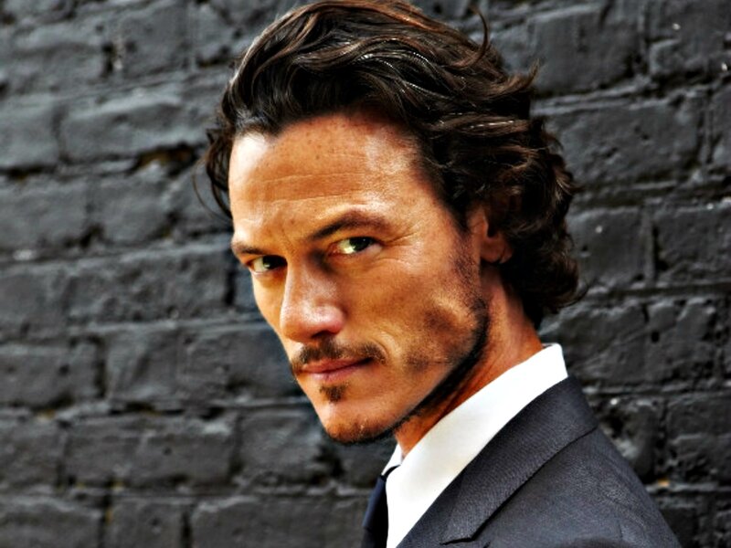 Man with Wavy Hair — Gray, Serious