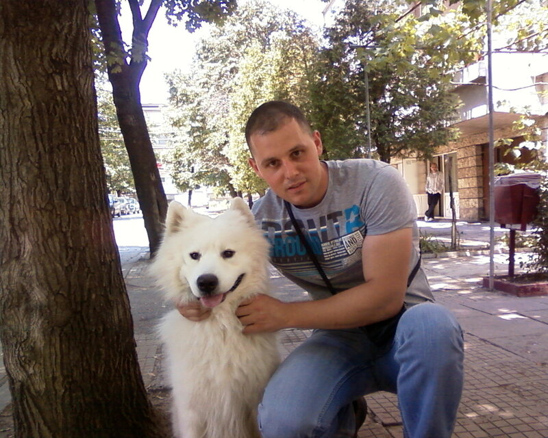 Man with White Dog