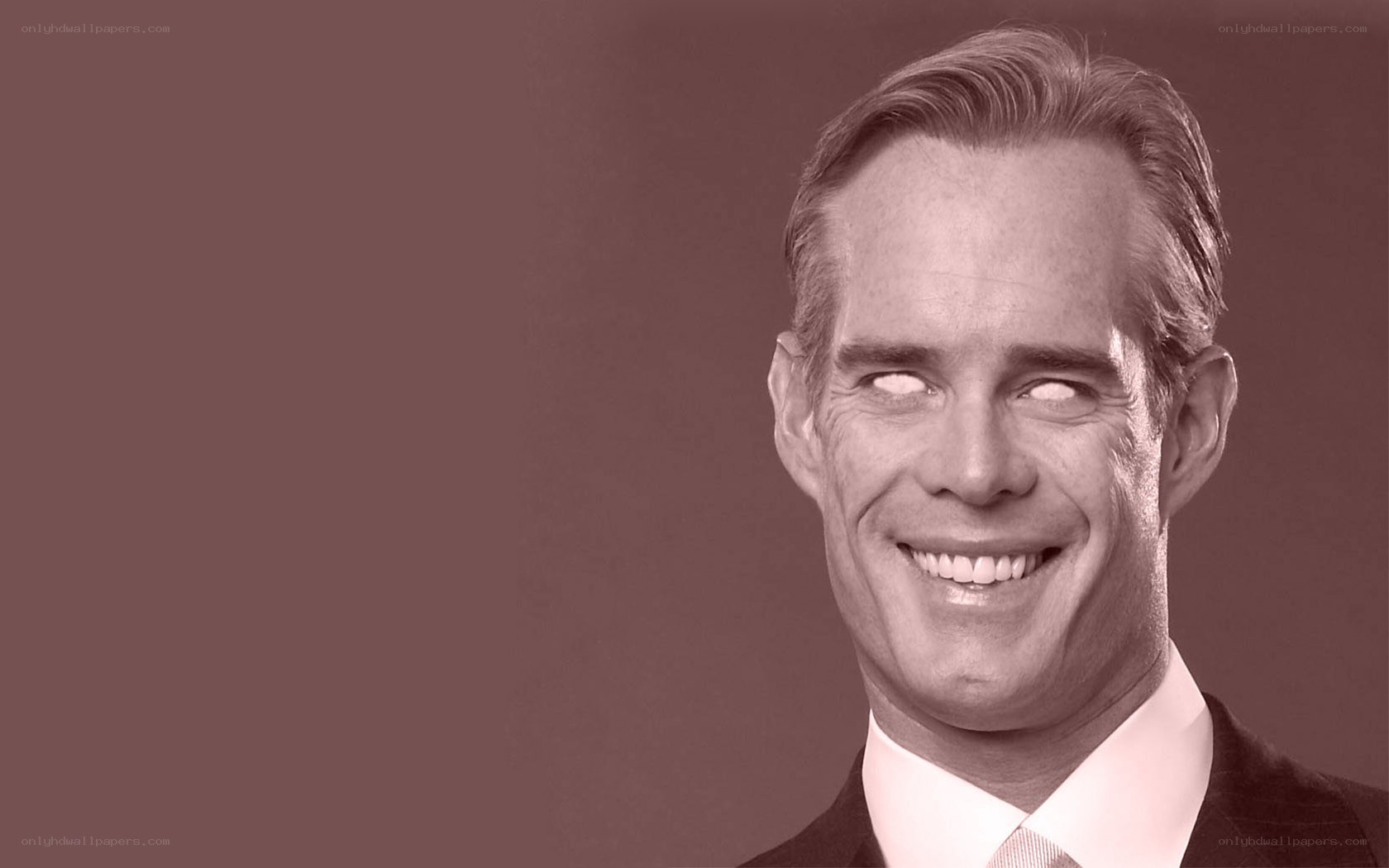 man with white eyes smiling