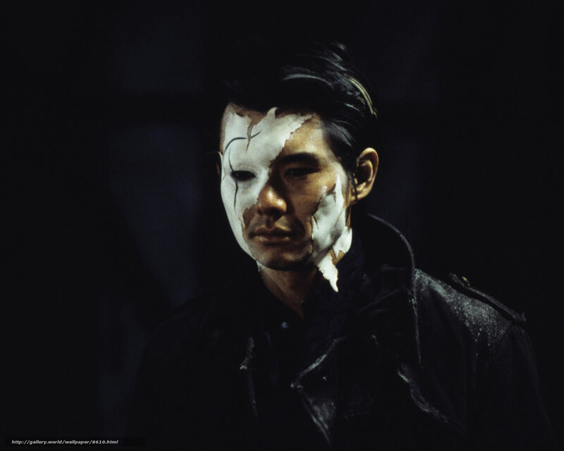 man with white face paint
