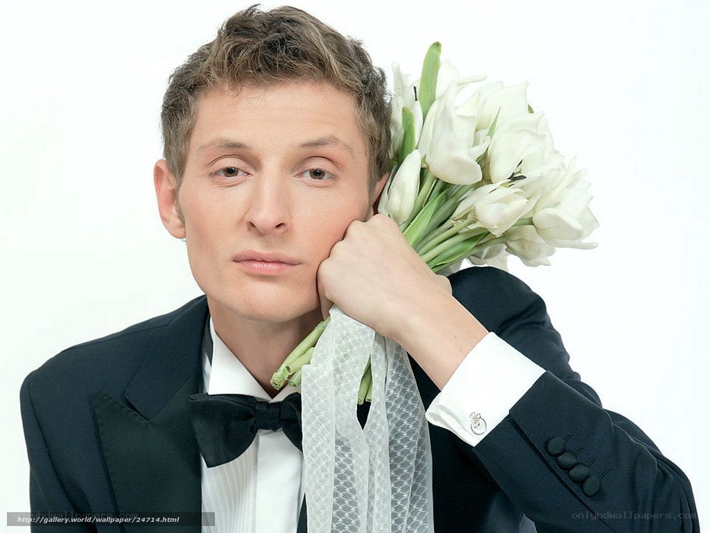 man with white tulips