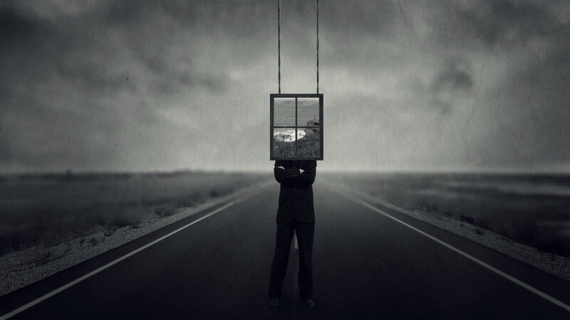 man with window head on road