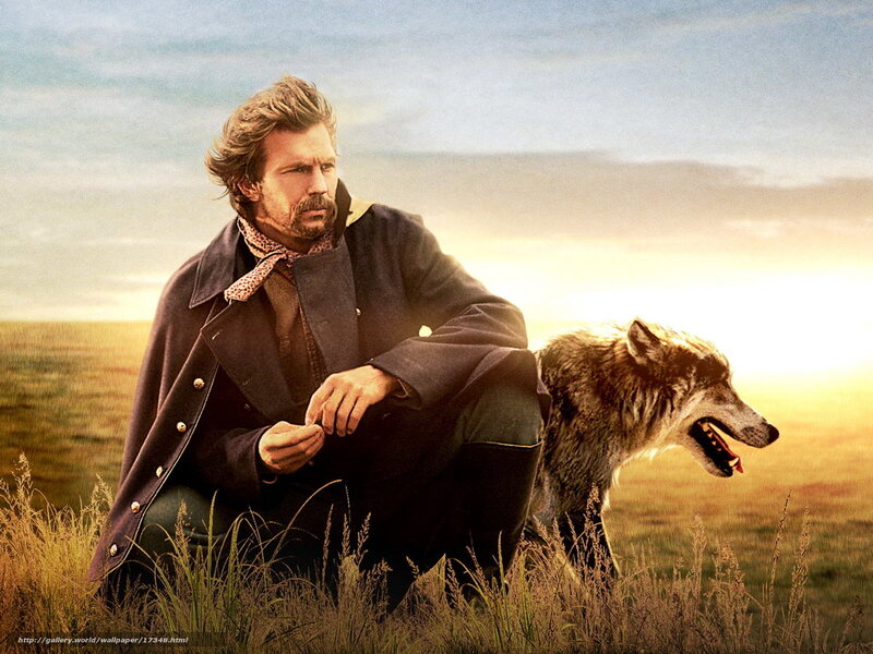 man with wolf in field