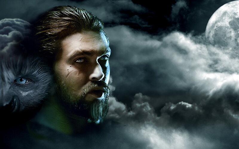 man with wolf in moonlight