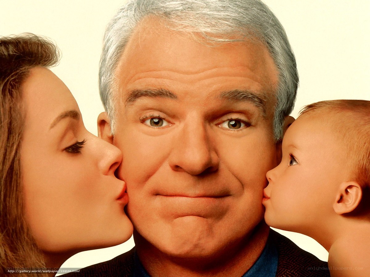 man with woman and baby