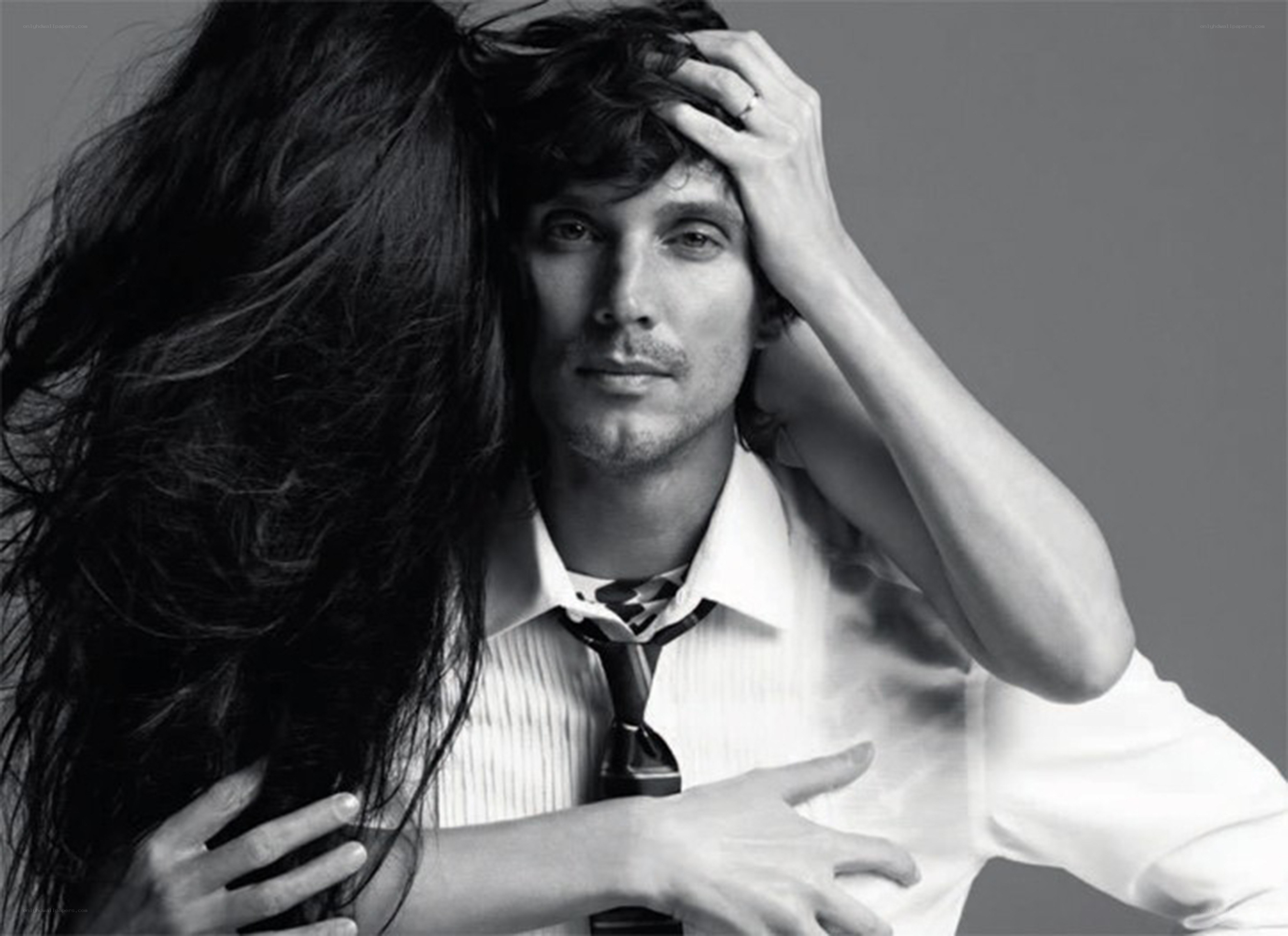 man with woman embracing