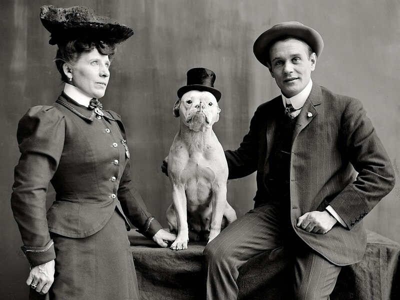 Man Woman Dog in Hats