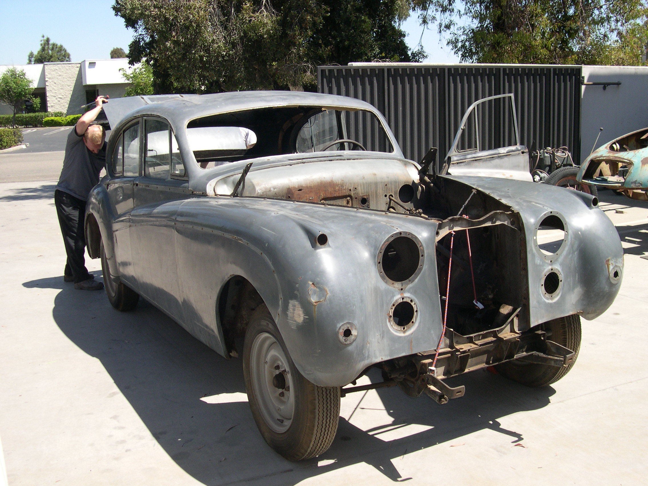 Man working on classic car