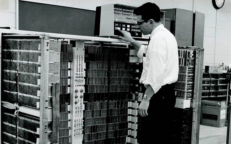 Man working on computer equipment