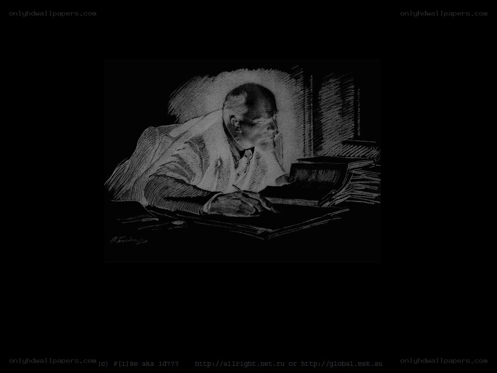 Man writing at a desk