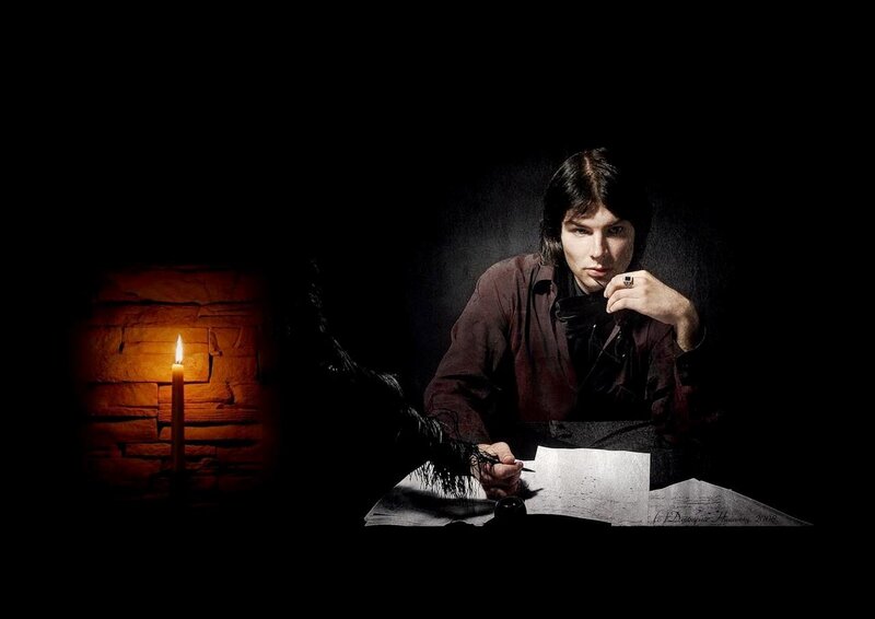 Man Writing at Desk — Black, Dramatic