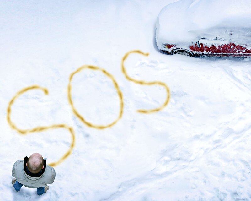 Man Writing in Snow