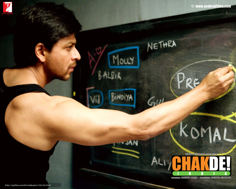 Man Writing on Blackboard