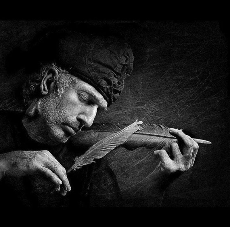 Man Writing with Quill