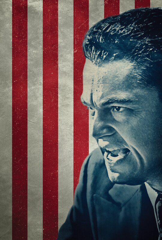 man yelling against flag