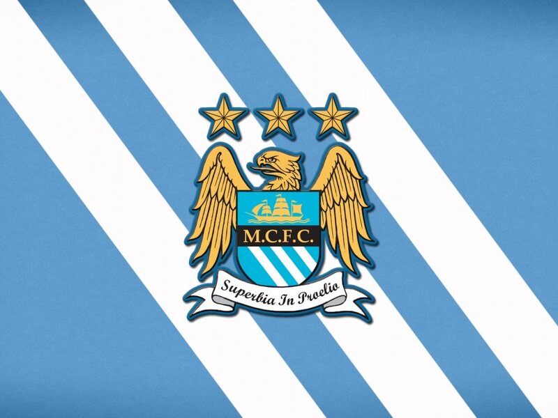 Manchester City FC crest on striped background