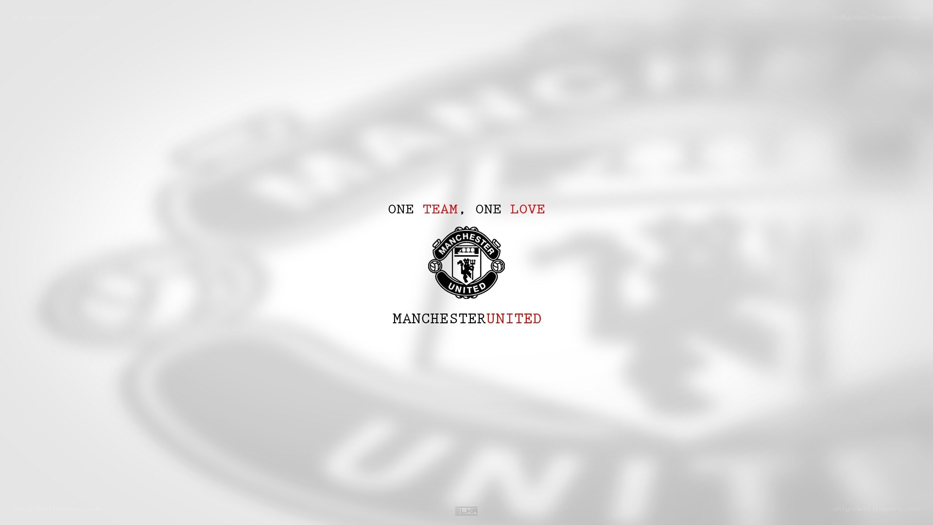 Manchester United logo and slogan