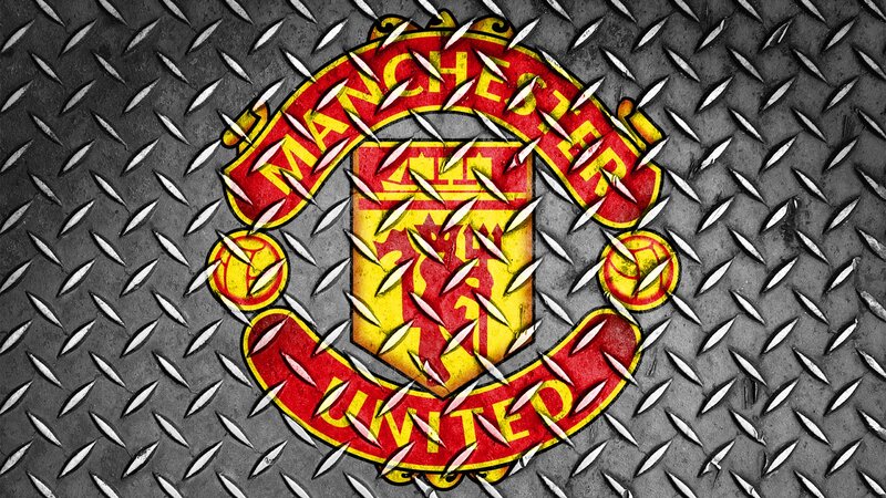 Manchester United logo on metal