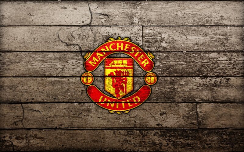 Manchester United logo on wood