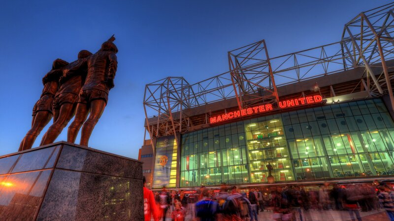 Manchester United stadium at dusk