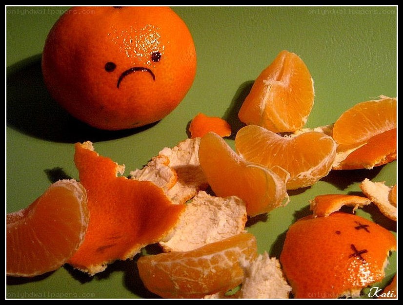 Mandarin oranges with sad faces