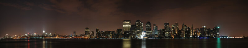 Manhattan Skyline at Night — Black, Calm, Photograph, Skyscrapers, Water