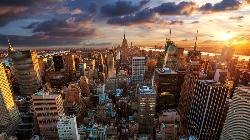 Manhattan Skyline at Sunset — Orange, Dramatic, Photograph, Skyscrapers, Clouds