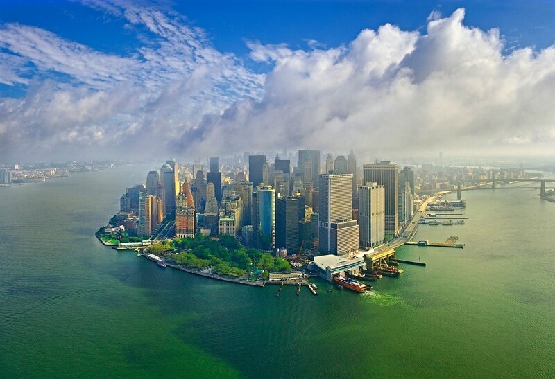Manhattan Skyline — Blue, Dramatic, Afternoon, Photograph, Skyscrapers, River, Clouds, Boats