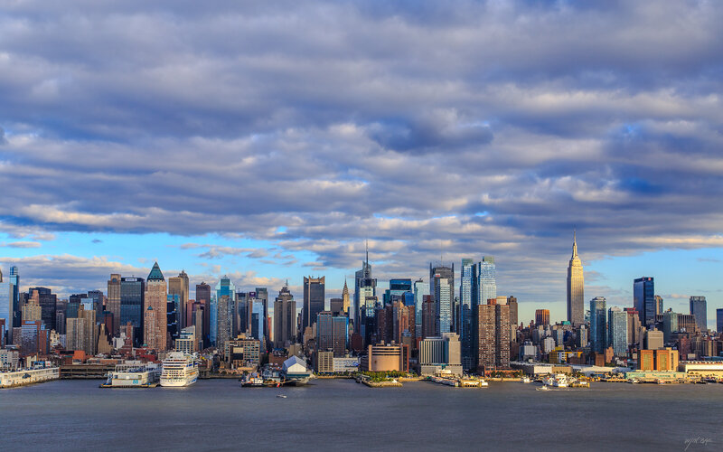 Manhattan Skyline — Blue, Dramatic, Afternoon, Photograph, Skyscrapers, River, Clouds